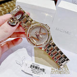  Shop Authentic Michael Kors Lennox Three Hand Rose Gold Dial Rose Gold Steel Strap Watch For Women - MK7230 - Luxxuri