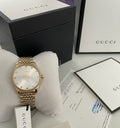  Shop Authentic Gucci G Timeless Quartz Silver Dial Gold Steel Strap Watch For Women - YA1264155 - Luxxuri