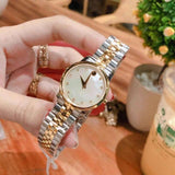  Shop Authentic Movado Museum Classic Diamonds Mother of Pearl Dial Two Tone Steel Strap Watch For Women - 0606613 - Luxxuri