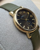  Shop Authentic Marc Jacobs Baker Olive Dial Olive Leather Strap Watch for Women - MBM1330 - Luxxuri