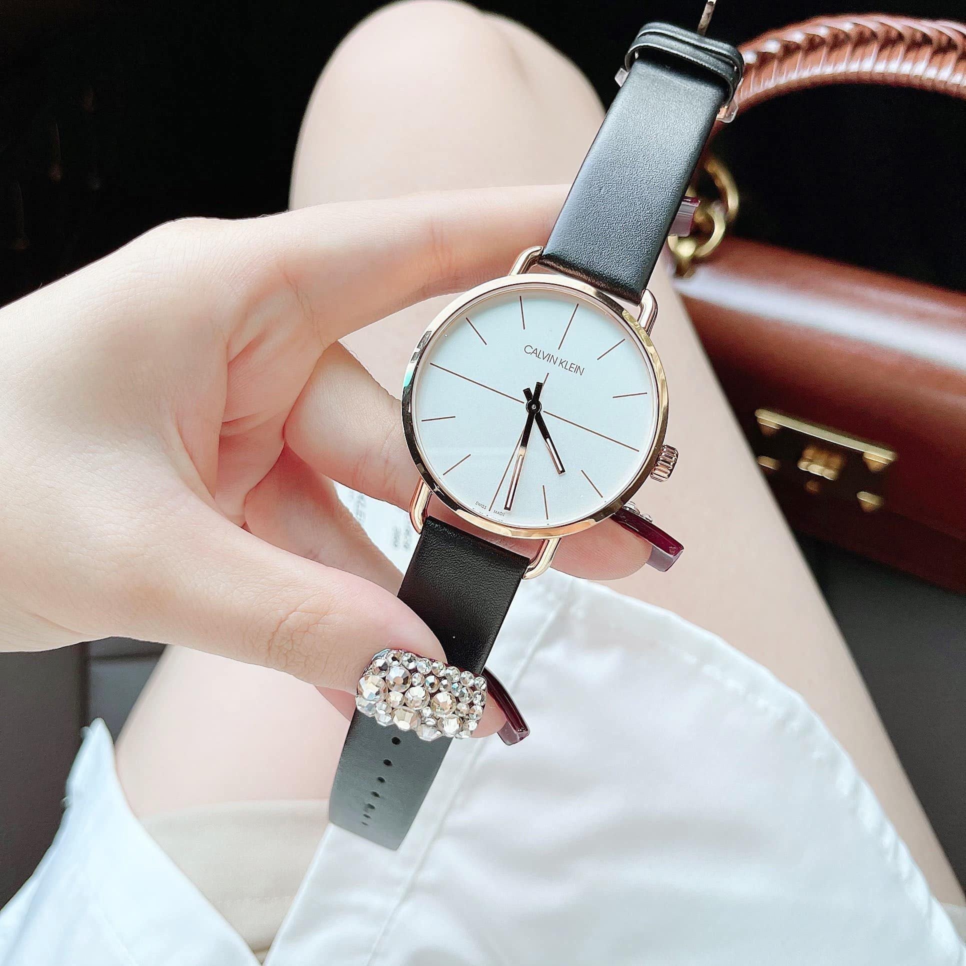  Shop Authentic Calvin Klein Even White Dial Black Leather Strap Watch for Women - K7B236C6 - Luxxuri