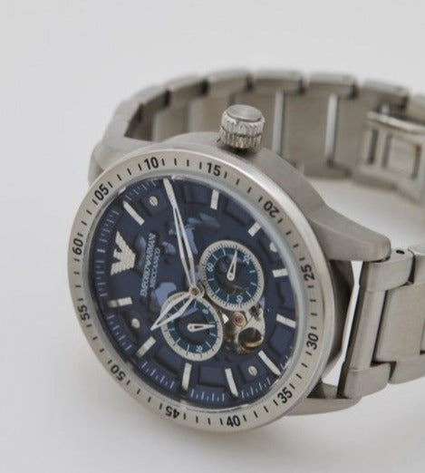  Shop Authentic Emporio Armani Mario Chronograph Automatic Blue Dial Silver Steel Strap Watch For Men - AR60052 - Luxxuri