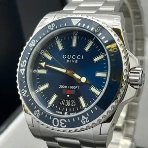  Shop Authentic Gucci Dive Quartz Blue Dial Silver Steel Strap Watch For Men - YA136311 - Luxxuri