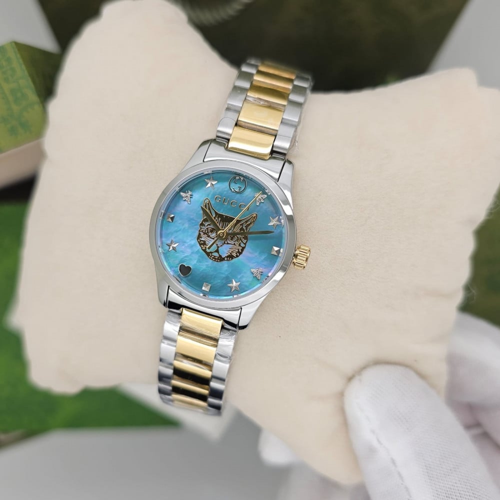  Shop Authentic Gucci G Timeless Quartz Mother of Pearl Blue Dial Two Tone Steel Strap Watch For Women - YA1265011 - Luxxuri