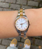  Shop Authentic Tissot T Classic PR100 Mother of Pearl Dial Two Tone Steel Strap Watch for Women - T101.010.22.111.01 - Luxxuri