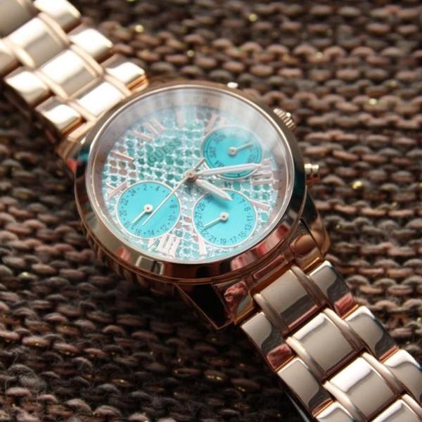  Shop Authentic Guess Mini Sunrise Multi Function Analog Turquoise Dial Rose Gold Steel Strap Watch For Women - W0448L8 - Luxxuri