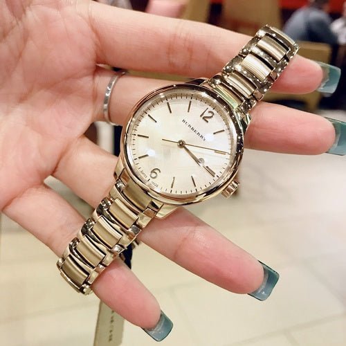  Shop Authentic Burberry The Classic Champagne Dial Gold Steel Strap Watch for Women - BU10109 - Luxxuri