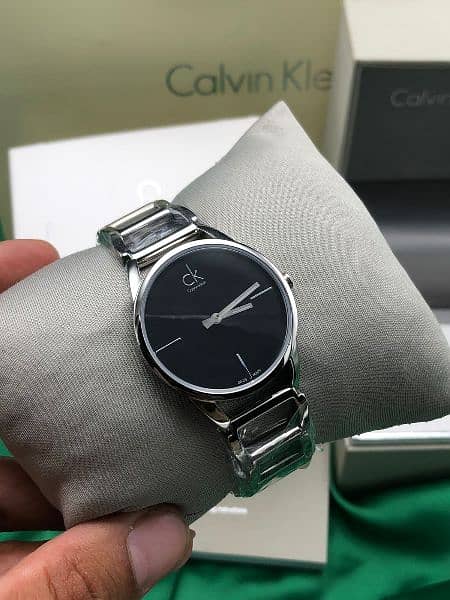  Shop Authentic Calvin Klein Stately Black Dial Silver Steel Strap Watch for Women - K3G23121 - Luxxuri