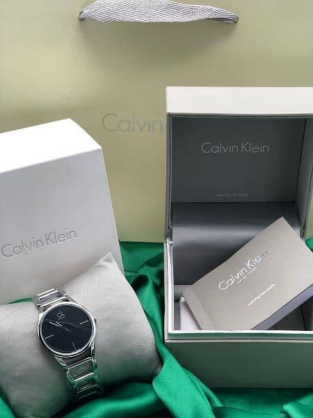  Shop Authentic Calvin Klein Stately Black Dial Silver Steel Strap Watch for Women - K3G23121 - Luxxuri