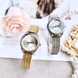  Shop Authentic Guess Whisper Silver Dial Gold Mesh Bracelet Watch for Women - W1084L2 - Luxxuri