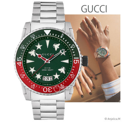  Shop Authentic Gucci Dive Quartz Green Dial Silver Steel Strap Watch For Men - YA136222 - Luxxuri