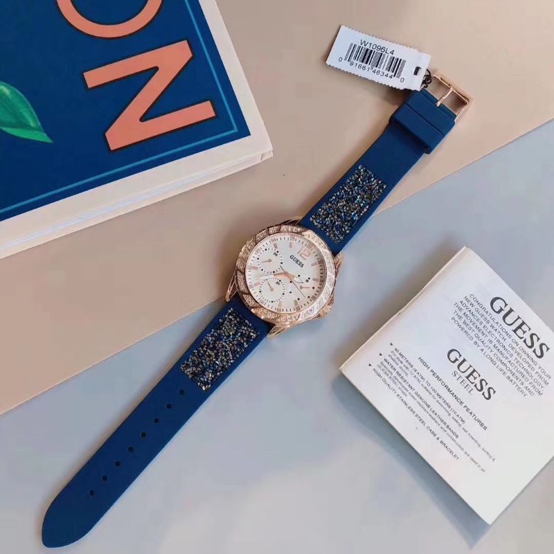 Guess Swirl Analog Quartz White Dial Blue Rubber Strap Watch for Women - W1096L4