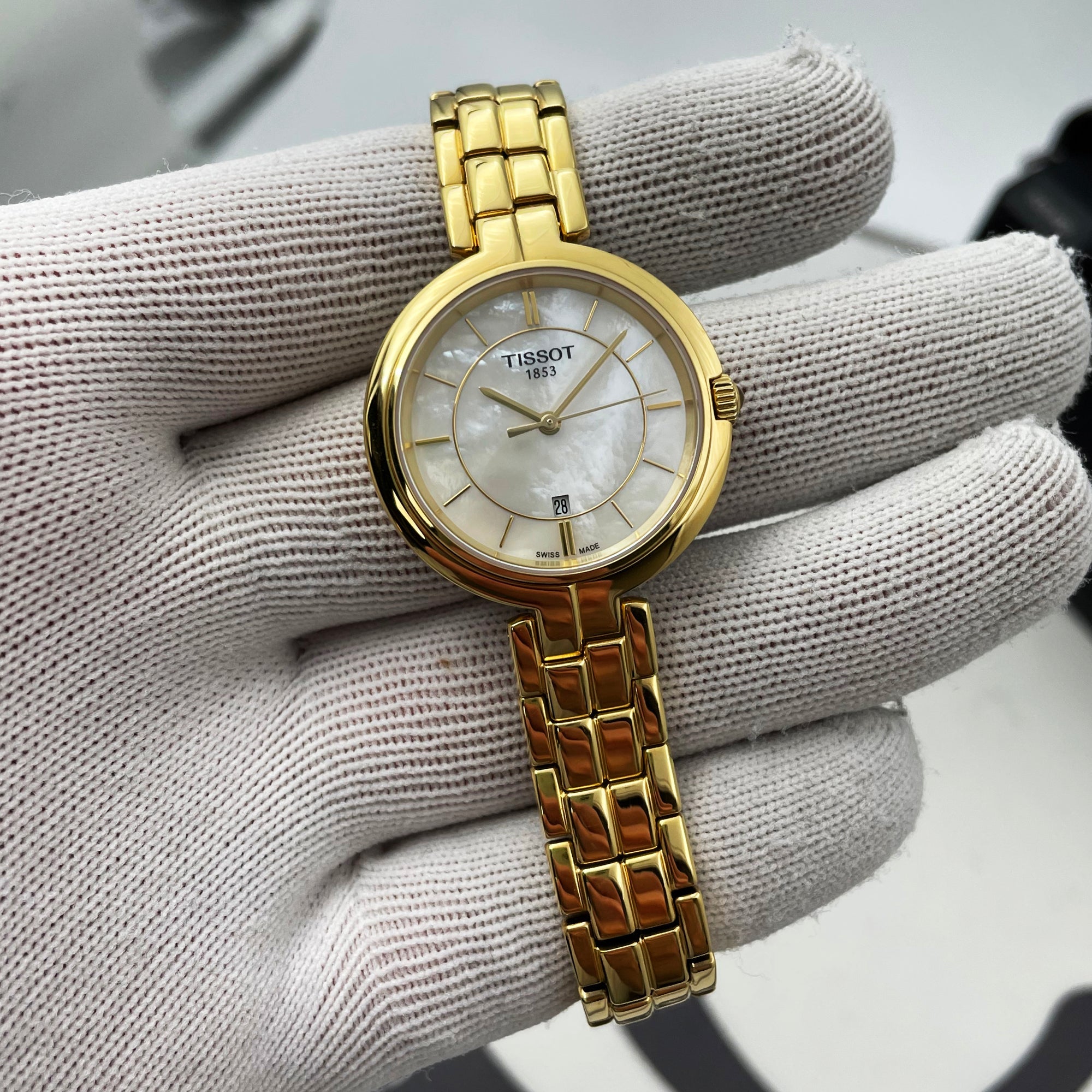 Tissot Flamingo Mother of Pearl White Dial Gold Steel Strap Watch For Women - T094.210.33.111.00
