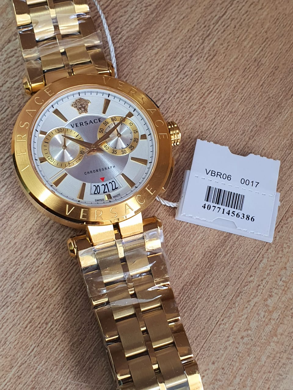  Shop Authentic Versace V Racer Chronograph White Dial Gold Steel Strap Watch for Men - VBR060017 - Luxxuri