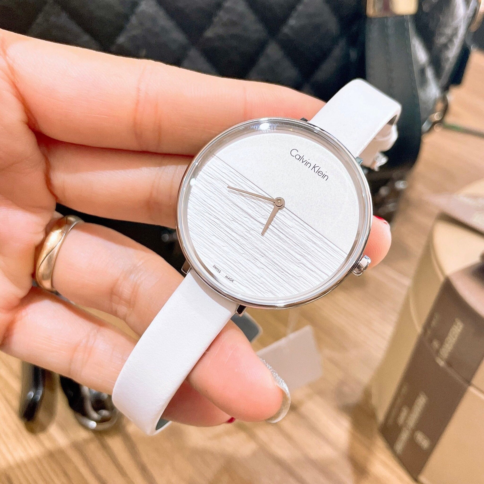  Shop Authentic Calvin Klein Rise White Grey Dial White Leather Strap Watch for Women - K7A231L6 - Luxxuri