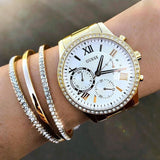  Shop Authentic Guess Solar Chronograph Diamonds White Dial Gold Steel Strap Watch for Women - W1069L2 - Luxxuri