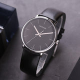  Shop Authentic Calvin Klein High Noon Quartz Black Dial Black Leather Strap Watch for Men - K8M211C1 - Luxxuri