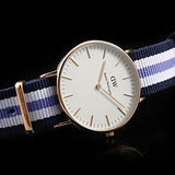  Shop Authentic Daniel Wellington Classic Trinity White Dial Three Tone Nylon Strap Watch For Women - 0509DW - Luxxuri