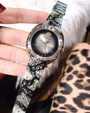  Shop Authentic Versace Shadov Quartz Silver Dial Snakeskin Green Leather Strap Watch for Women - VEBM00718 - Luxxuri