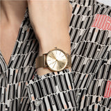  Shop Authentic Armani Exchange Lola Analog Gold Dial Gold Mesh Strap Watch For Women - AX5536 - Luxxuri