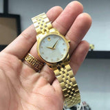  Shop Authentic Movado Museum Classic Diamonds Mother of Pearl Dial Gold Steel Strap Watch For Women - 0606998 - Luxxuri