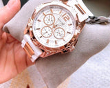  Shop Authentic Guess Intrepid White Dial Two Tone Silicone Strap Watch For Women - W0325L6 - Luxxuri
