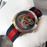  Shop Authentic Gucci G Timless Le Marche Des Merveilles Blue & Red Dial Blue & Red Nylon Strap Unisex Watch  - YA126495 - Luxxuri