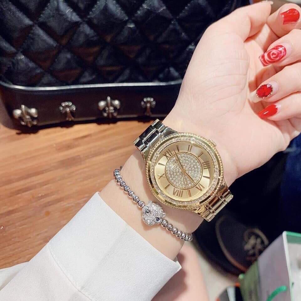  Shop Authentic Guess Madison Diamonds Gold Dial Gold Steel Strap Watch for Women - W0637L2 - Luxxuri