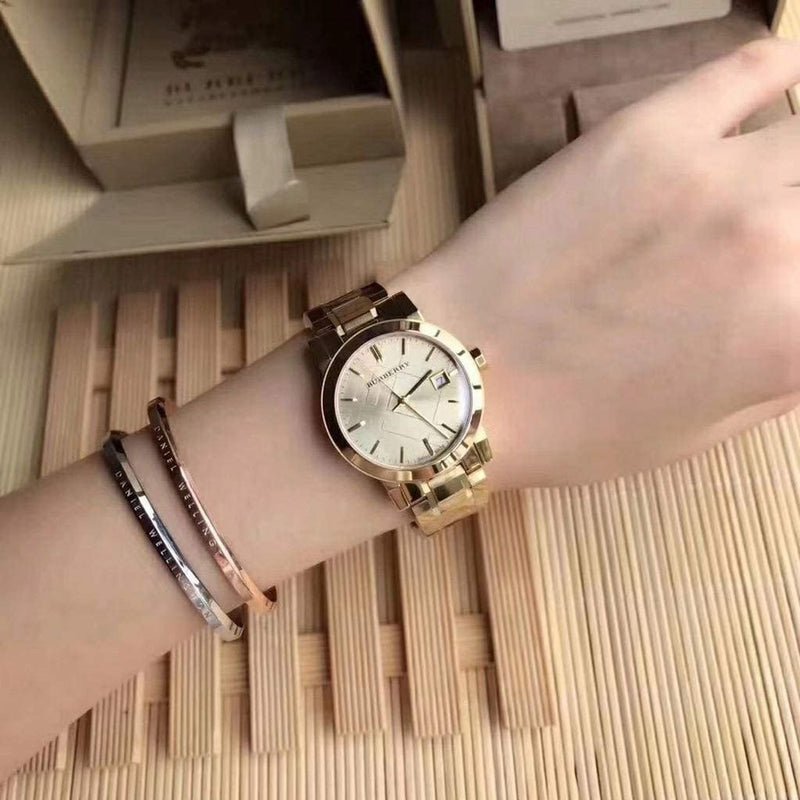  Shop Authentic Burberry The City Gold Dial Gold Steel Strap Watch for Women - BU9134 - Luxxuri