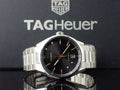  Shop Authentic Tag Heuer Carrera Black Dial Silver Steel Strap Watch for Men - WBN2113.BA0639 - Luxxuri