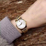  Shop Authentic Movado Museum Classic Diamonds Mother of Pearl Dial Gold Steel Strap Watch For Women - 0606998 - Luxxuri