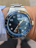  Shop Authentic Tag Heuer Autavia Cosc GMT Automatic Blue Dial Silver Steel Strap Watch for Men - WBE511A.BA0650 - Luxxuri