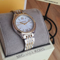  Shop Authentic Michael Kors Mindy Three Hand White Dial Two Tone Steel Strap Watch For Women - MK7084 - Luxxuri