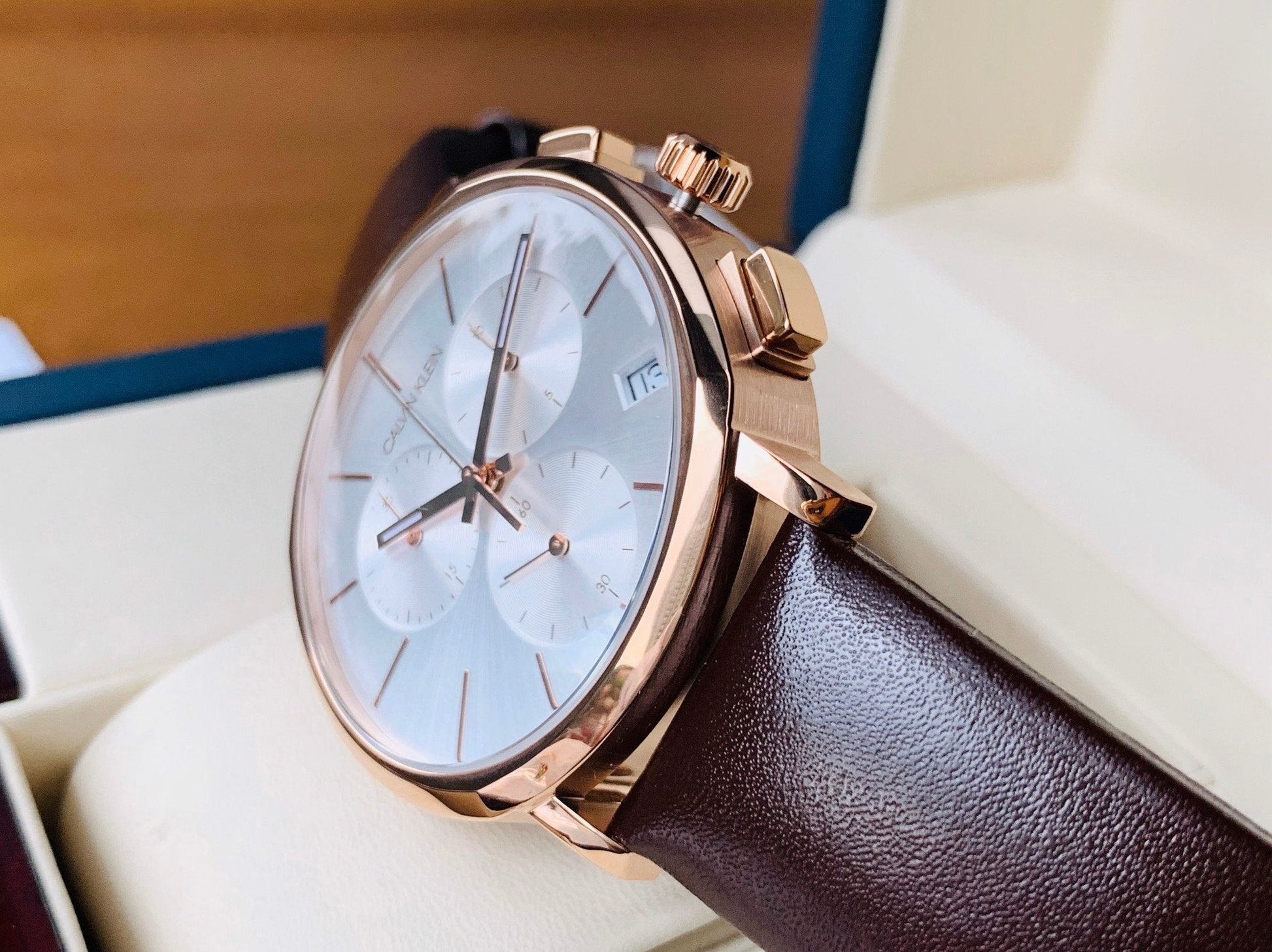  Shop Authentic Calvin Klein Posh Chronograph White Dial Brown Leather Strap Watch for Men - K8Q376G6 - Luxxuri