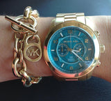  Shop Authentic Michael Kors Runway Stop Hunger Blue Dial Gold Steel Strap Watch for Men - MK8315 - Luxxuri