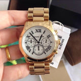  Shop Authentic Michael Kors Cooper Chronograph White Dial Gold Steel Strap Watch For Women - MK5916 - Luxxuri