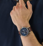  Shop Authentic Tommy Hilfiger Evan Chronograph Blue Dial Brown Leather Strap Watch for Men - 1710393 - Luxxuri