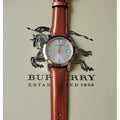  Shop Authentic Burberry The City Silver Dial Orange Leather Strap Watch for Women - BU9121 - Luxxuri