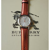  Shop Authentic Burberry The City Silver Dial Orange Leather Strap Watch for Women - BU9121 - Luxxuri