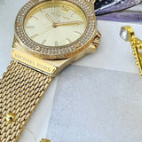  Shop Authentic Michael Kors Lennox Three-Hand Gold Dial Gold Mesh Bracelet Watch For Women - MK7335 - Luxxuri