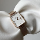  Shop Authentic Daniel Wellington Quadro Melrose White Dial Gold Mesh Strap Watch For Women - DW00100431 - Luxxuri