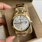  Shop Authentic Burberry The City White Dial Gold Steel Strap Watch for Women - BU9103 - Luxxuri
