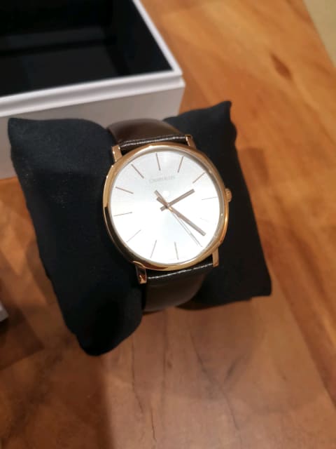  Shop Authentic Calvin Klein Posh Silver Dial Brown Leather Strap Watch for Men - K8Q316G6 - Luxxuri