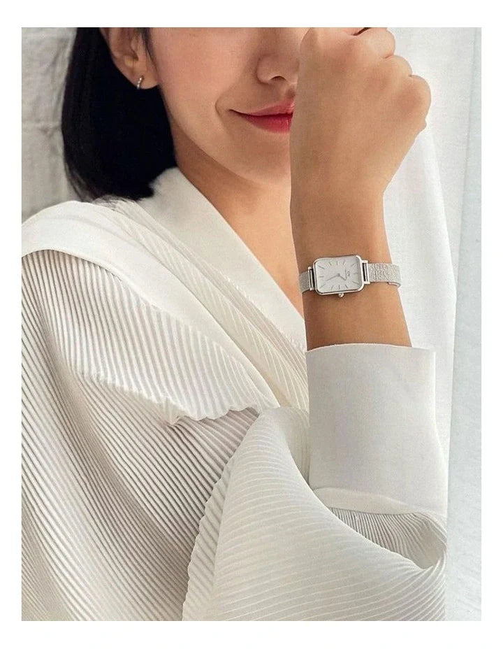  Shop Authentic Daniel Wellington Quadro Sterling White Dial Silver Mesh Strap Watch For Women - DW00100438 - Luxxuri