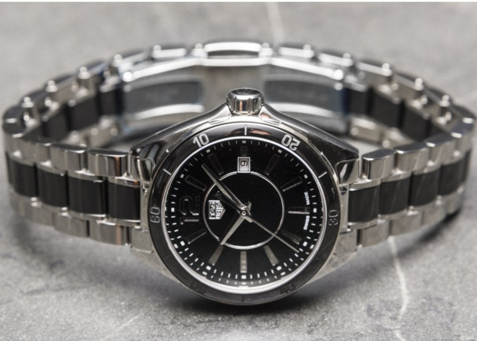  Shop Authentic Tag Heuer Formula 1 Quartz Black Dial Two Tone Steel Strap Watch for Women - WBJ141AA.BA0973 - Luxxuri