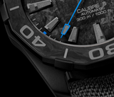  Shop Authentic Tag Heuer Aquaracer Calibre 5 Black Nylon Strap Carbon Dial Watch for Men -  WBD218C.FC6447 - Luxxuri
