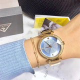  Shop Authentic Guess Park Avenue Blue Dial Gold Steel Strap Watch For Women - W0695L2 - Luxxuri