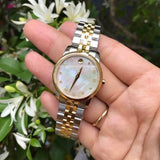  Shop Authentic Movado Museum Classic Diamonds Mother of Pearl Dial Two Tone Steel Strap Watch For Women - 0606613 - Luxxuri