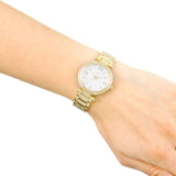  Shop Authentic Guess Park Ave South Analog White Dial Gold Steel Strap Watch For Women - W0767L2 - Luxxuri