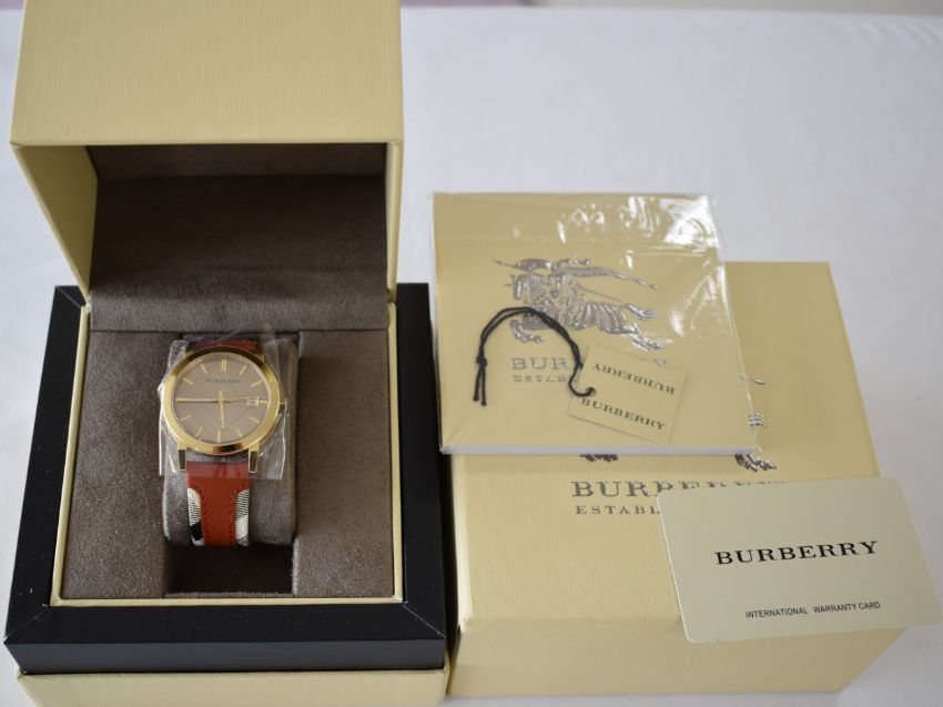  Shop Authentic Burberry The City Gold Dial Orange Leather Strap Watch for Women - BU9016 - Luxxuri